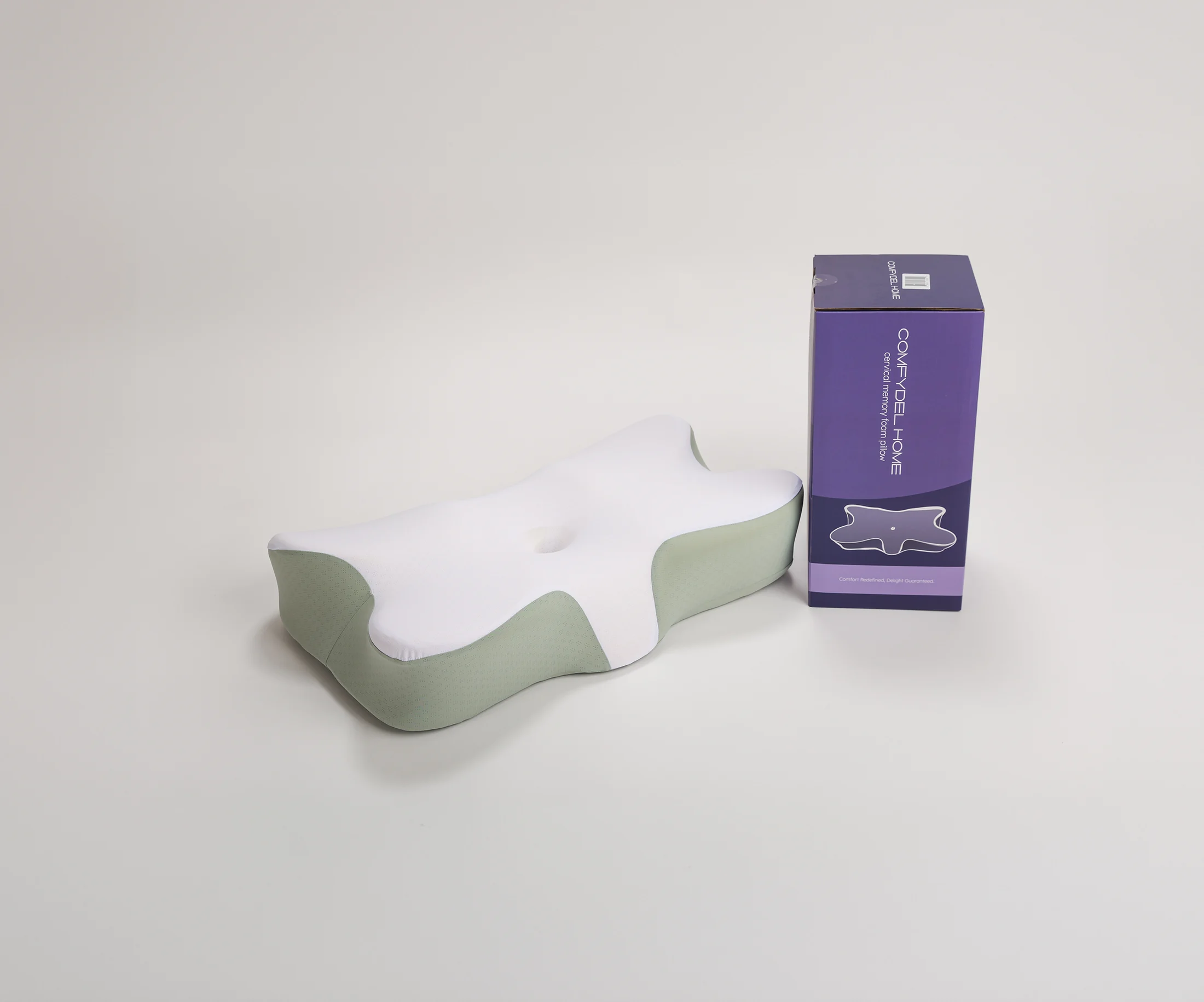 The pillow with its box.
